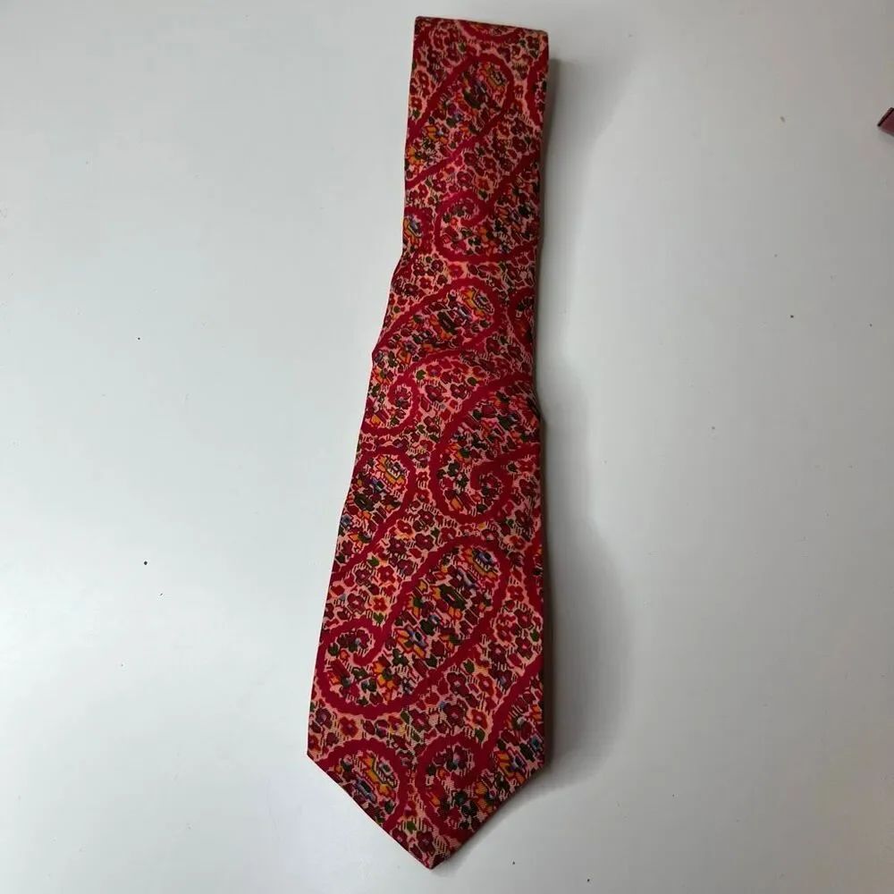 Liberty of London vintage red patterned silk necktie features a vibrant tie
